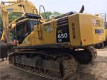Gebrauchter Komatsu 650-8 Bagger
